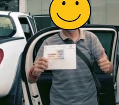 Customer with their renewed insurance in hand