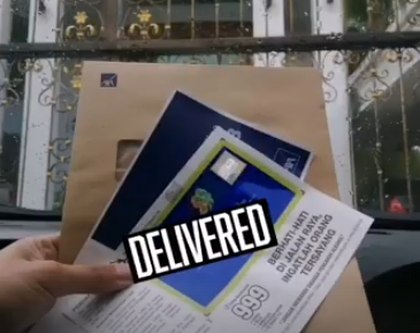 Roadtax documents delivered to a house gate